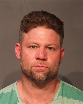 Booking photo of Andrew Charles Konrad
