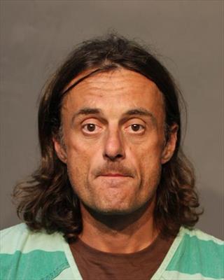 Booking photo of Almen Johnny Seric