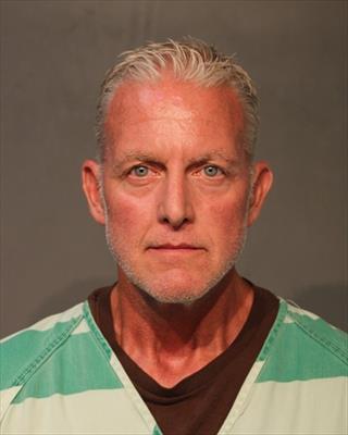 Booking photo of Todd Michael Thompson