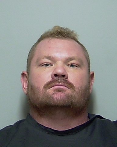Booking photo of Micah Atkinson