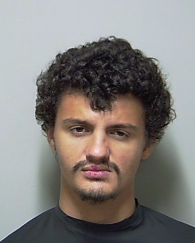 Booking photo of Charlie Wells
