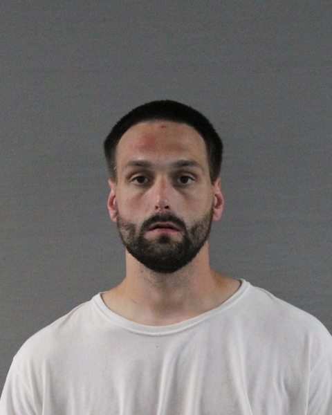 Booking photo of Justin James Schroeter