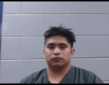 Booking photo of Andres Carmelo