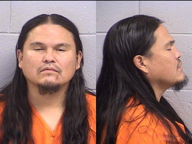 Booking photo of Derek Thompson