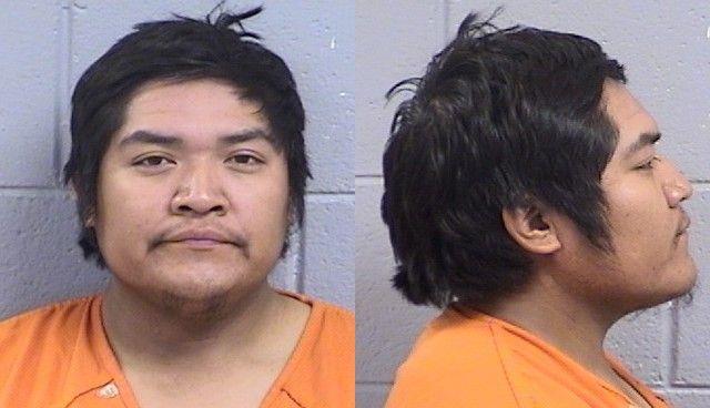 Booking photo of Malcolm Little