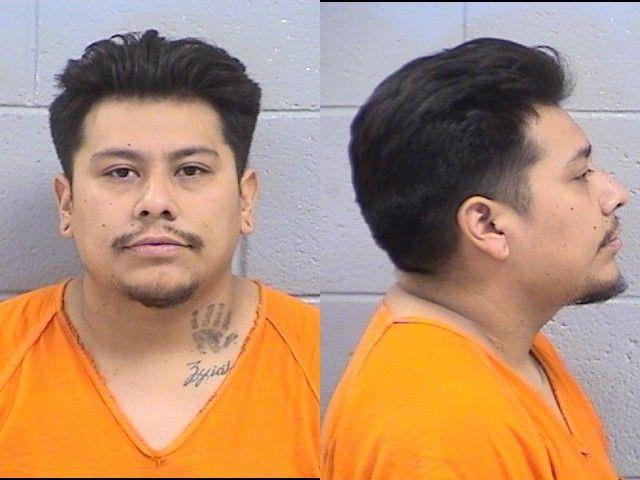 Booking photo of Caine Chimoni
