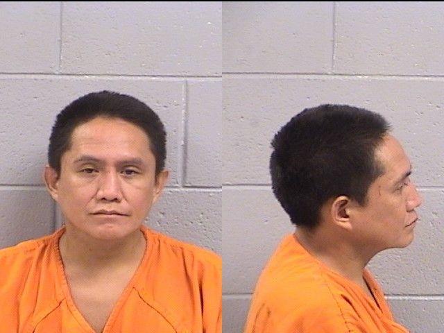 Booking photo of Rollin Tom