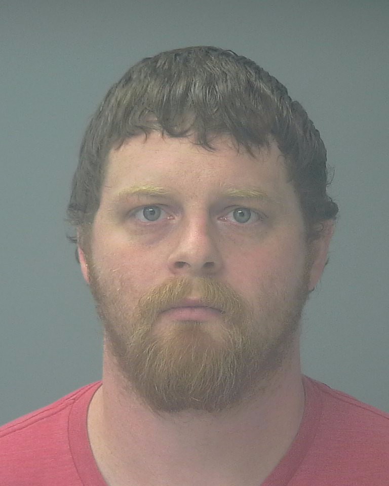 Booking photo of Justin Redd