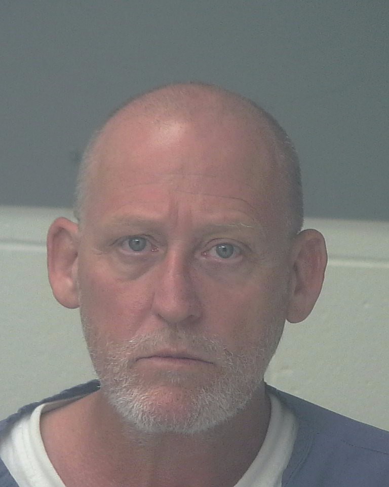 Booking photo of John Schneider