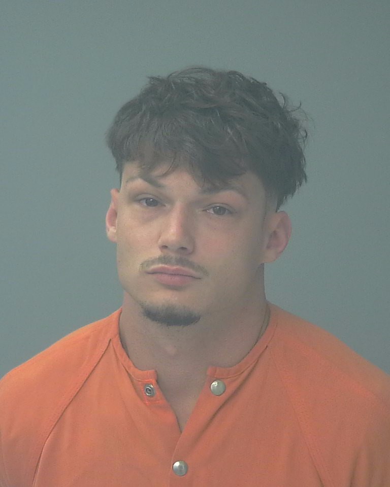 Booking photo of Christian Hogue