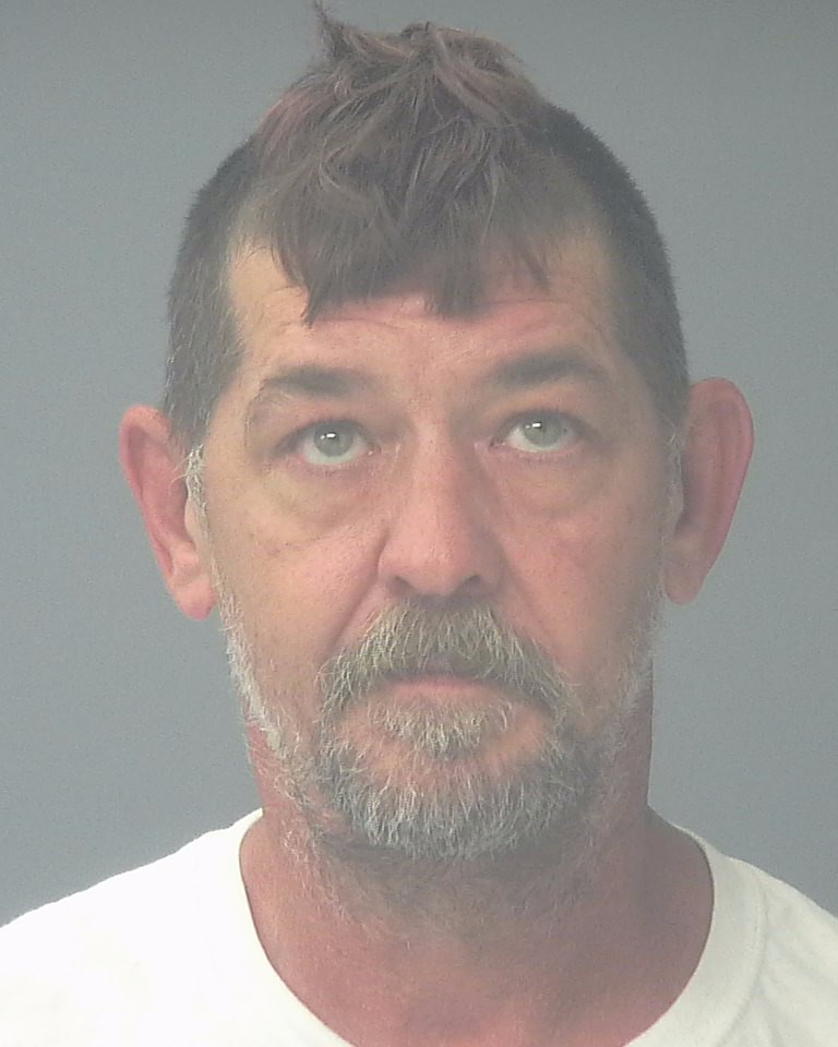 Booking photo of John Smith