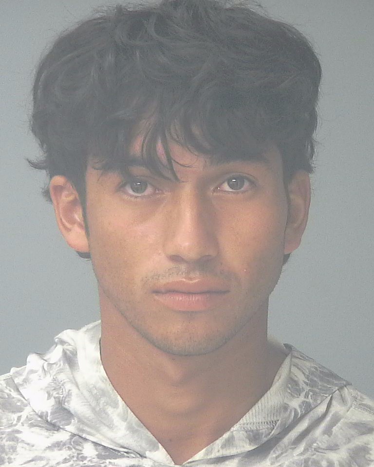 Booking photo of Angel Flores-martinez