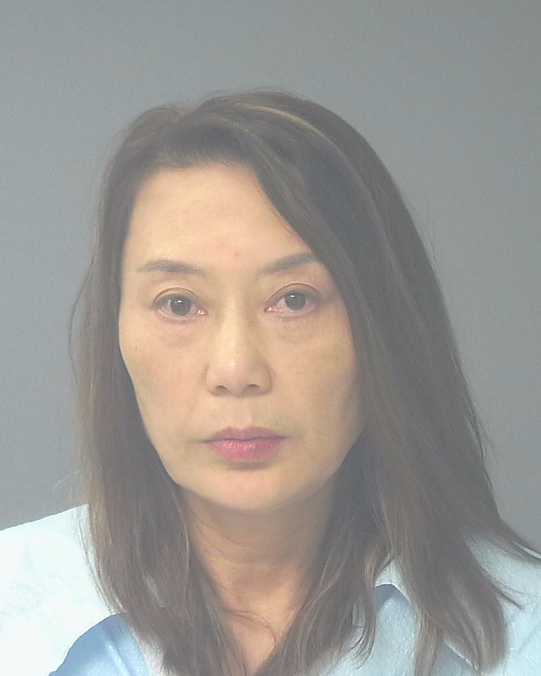 Booking photo of Xinping Xie