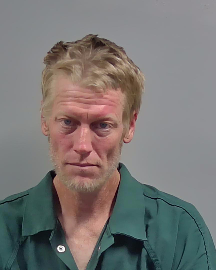 Booking photo of Johnny Dozier
