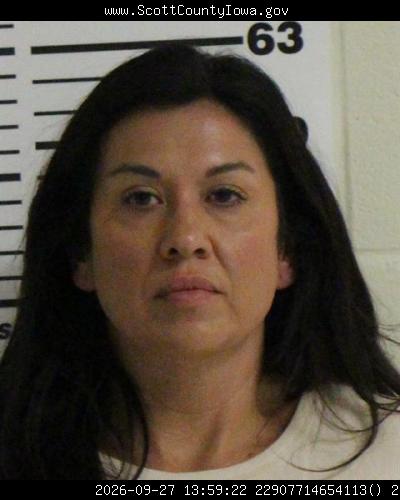 Booking photo of Carmen Schram