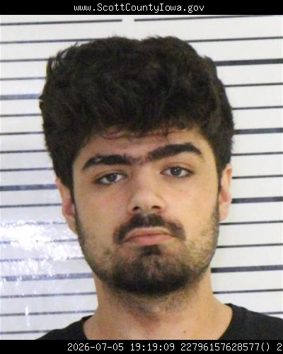 Booking photo of Hashem Suleiman