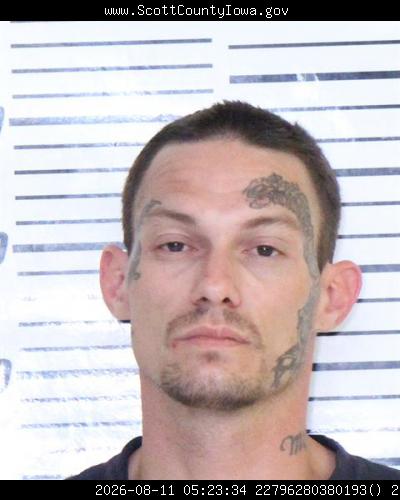 Booking photo of Justin Renstrom