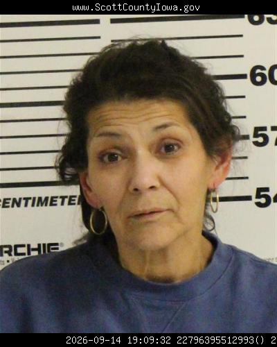 Booking photo of Kim Burgos