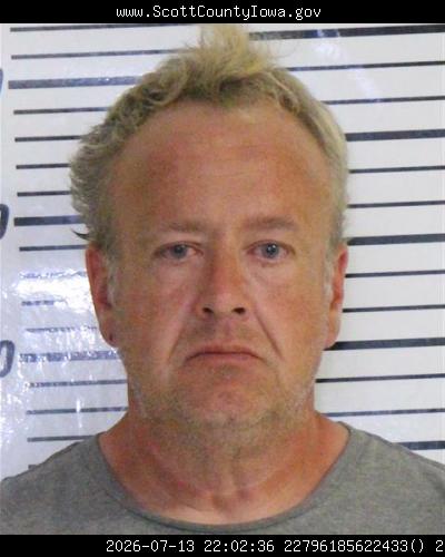 Booking photo of Joel Rickard