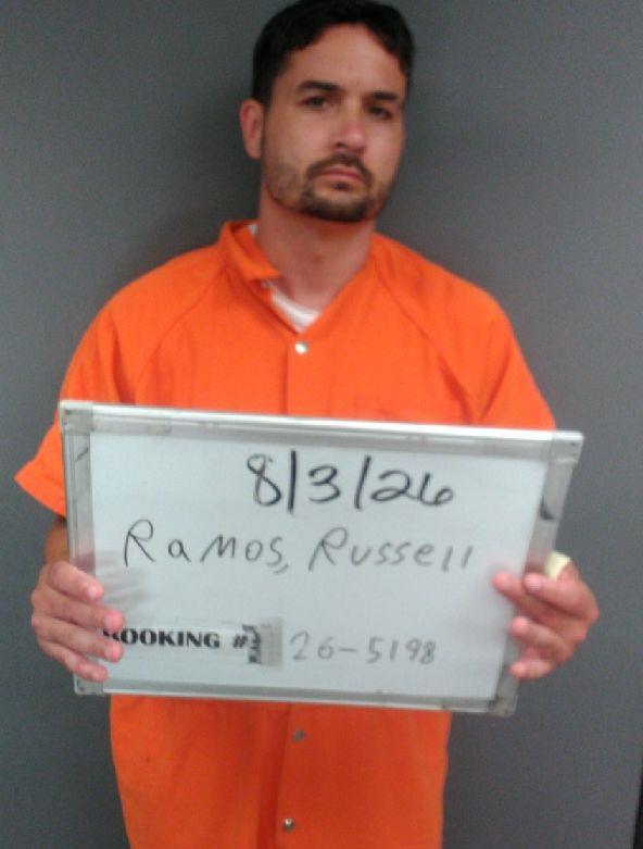 Booking photo of Russell Ramos