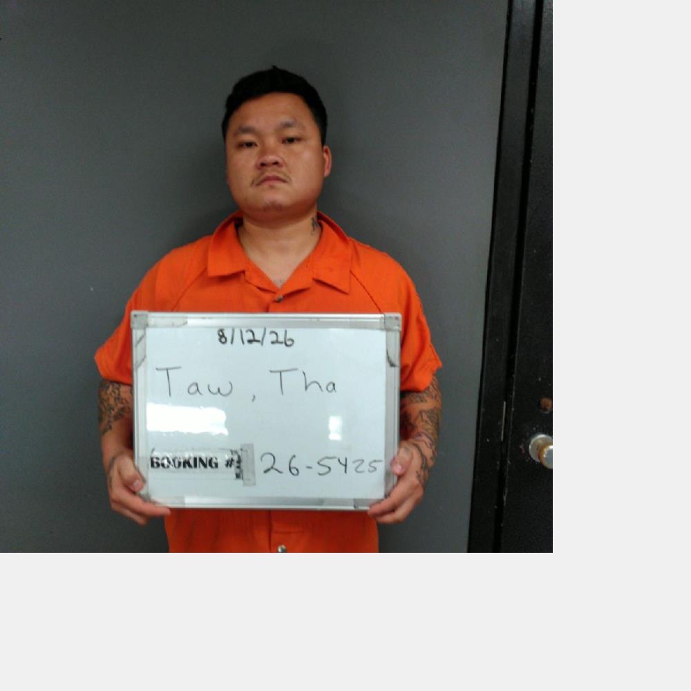 Booking photo of Tha Taw
