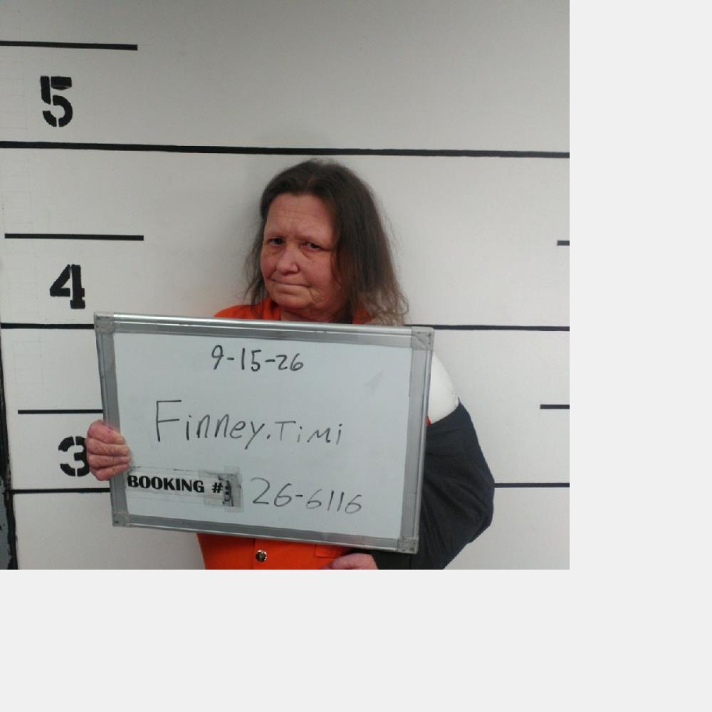 Timi Finney booking photo