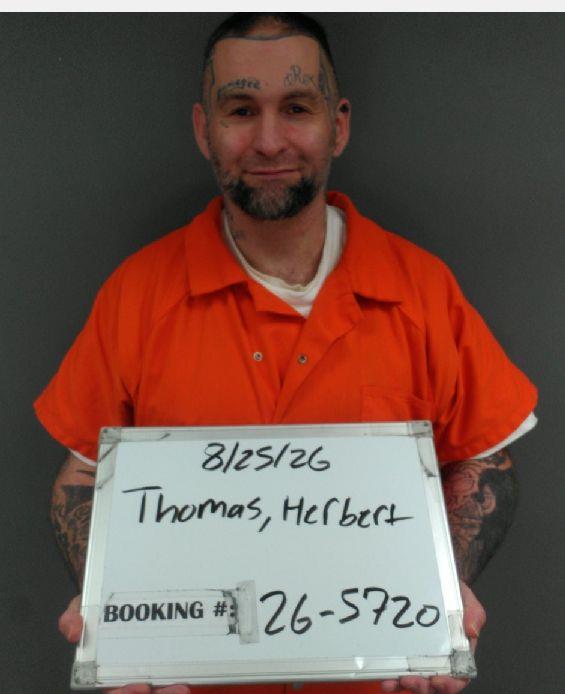 Booking photo of Herbert Thomas