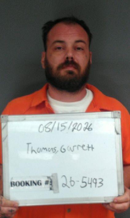Booking photo of Garrett Thomas