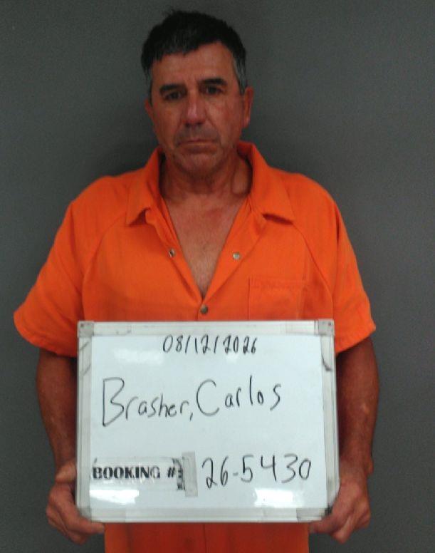 Booking photo of Carlos Brasher