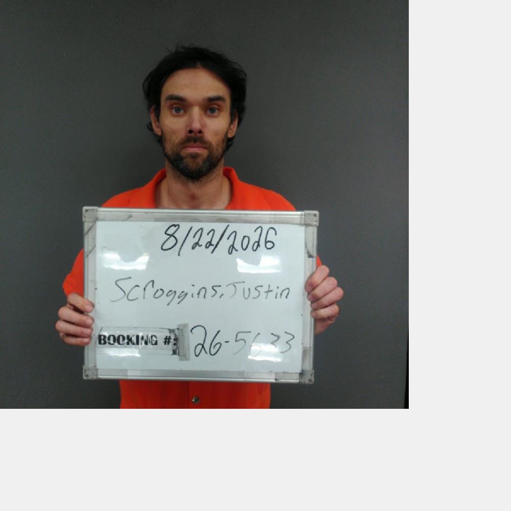 Booking photo of Justin Scroggins