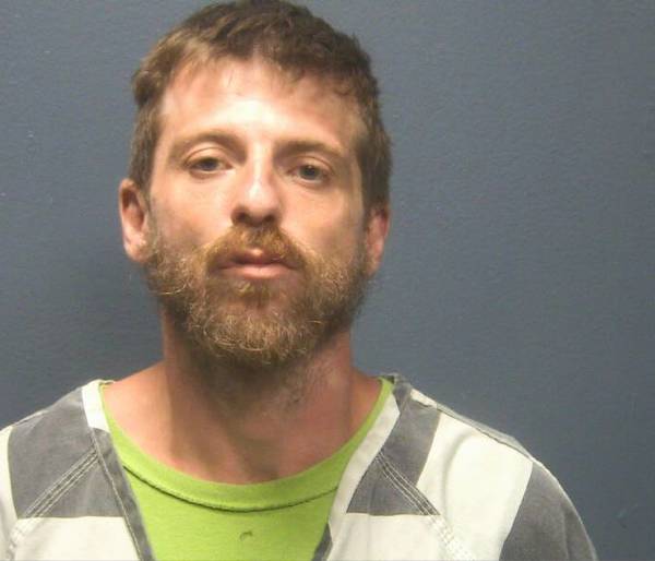 Booking photo of Derek Adams