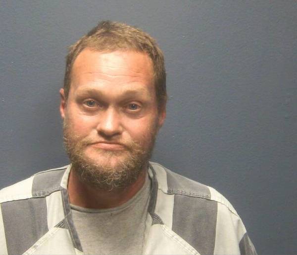 Booking photo of Michael Scott