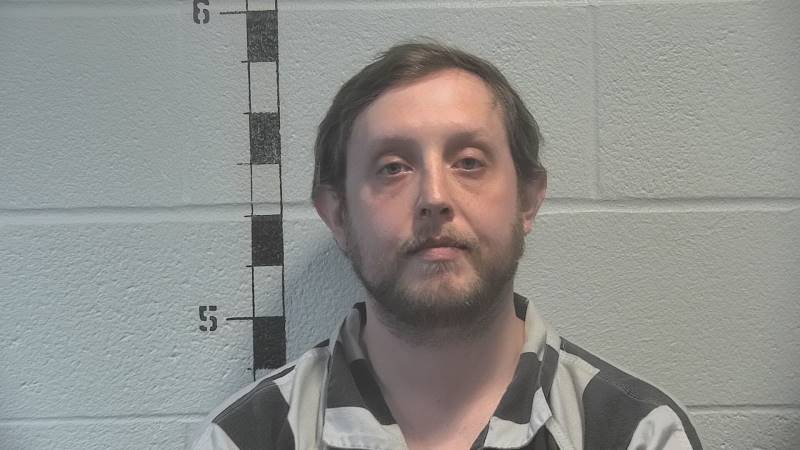 Booking photo of John Smith