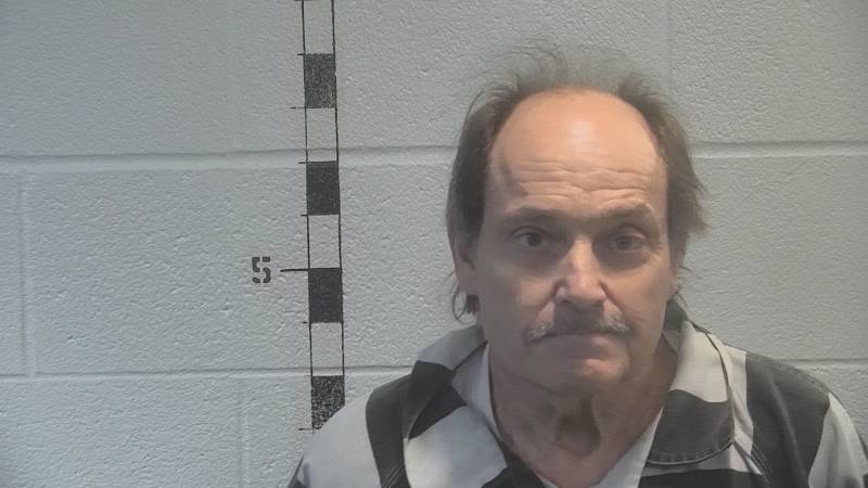 Booking photo of Michael Adams