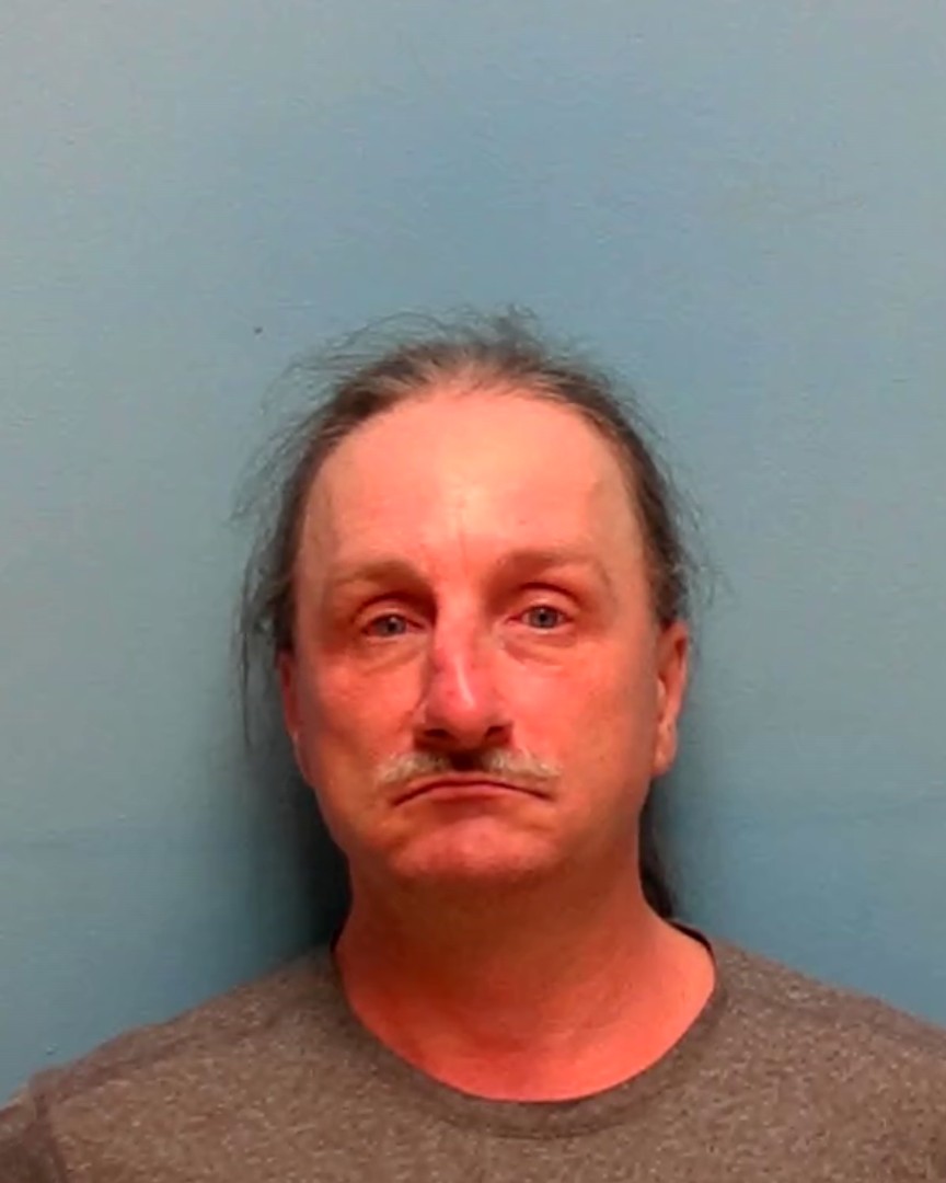 Booking photo of John Pierce