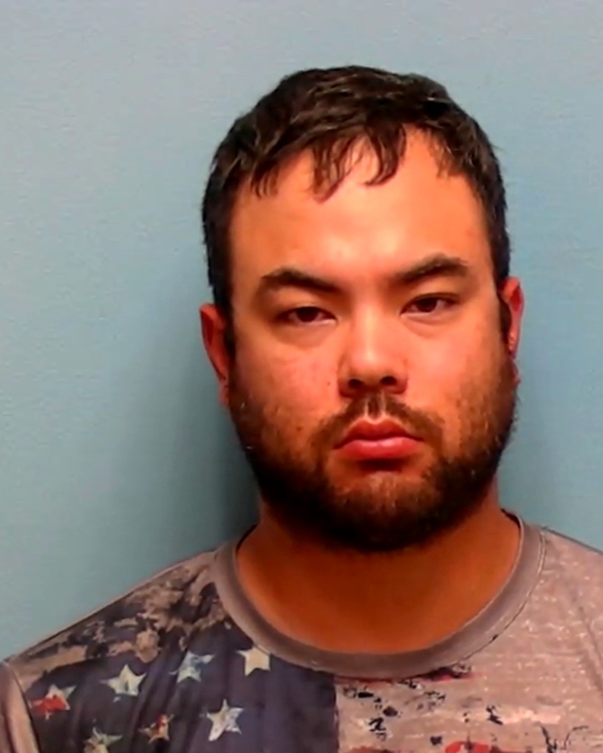 Booking photo of Christopher Khambong