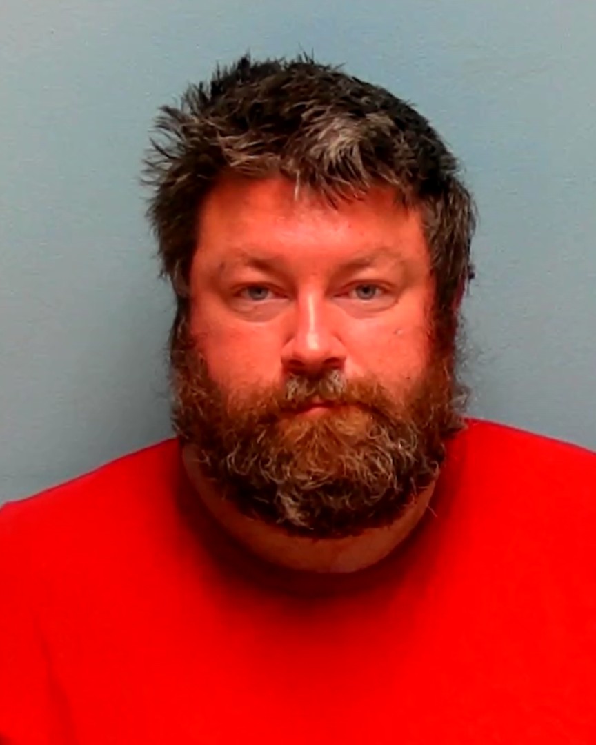 Booking photo of Cory Christensen