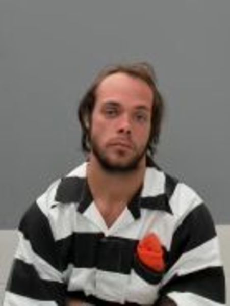 Booking photo of Christopher Rhoton