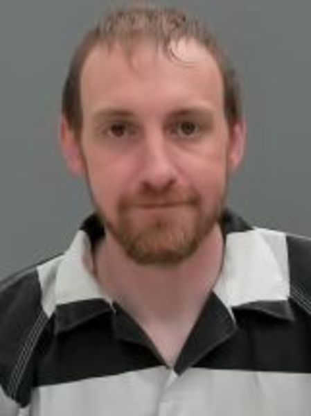 Booking photo of John Chapman
