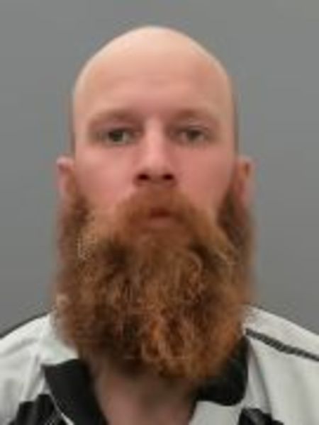 Booking photo of Cameron Thomason