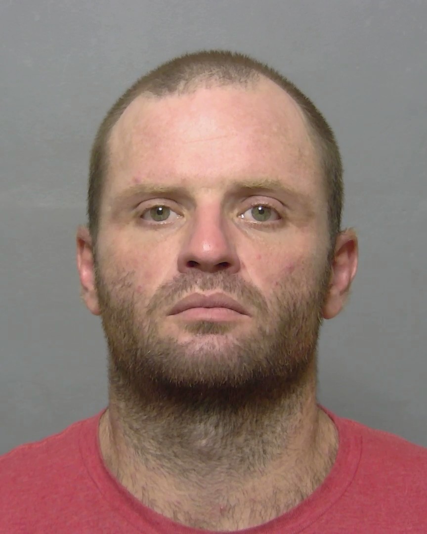 Booking photo of Tyler Kuhar