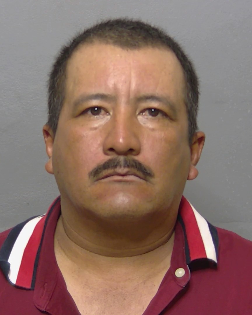 Booking photo of Henry Santos Aguilar
