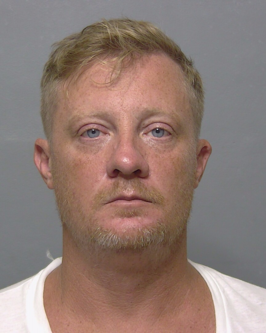 Booking photo of John Carpenter