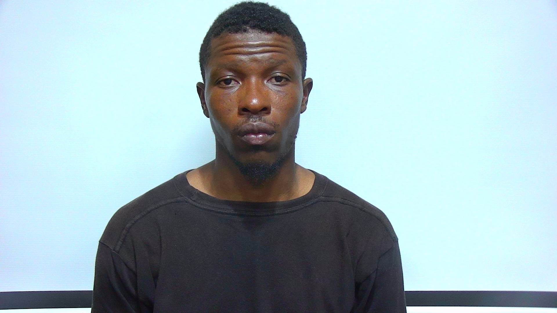 Booking photo of Adrian Michel