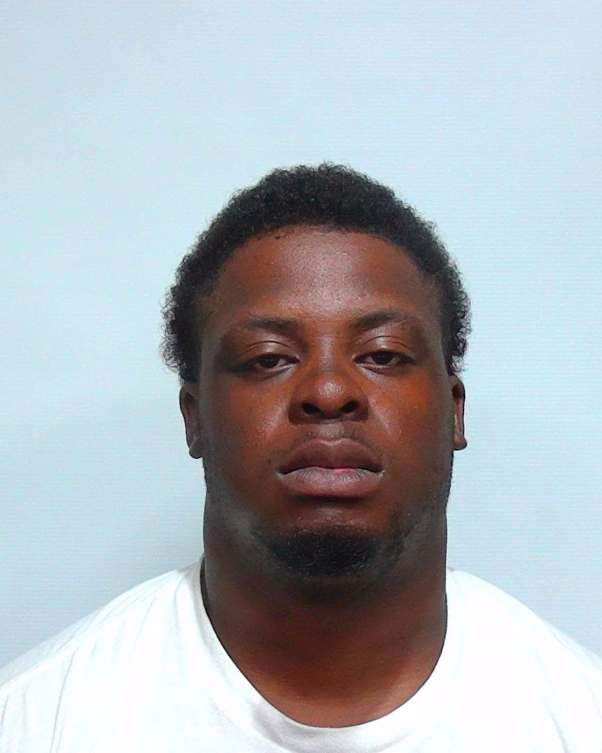 Booking photo of De Thompson