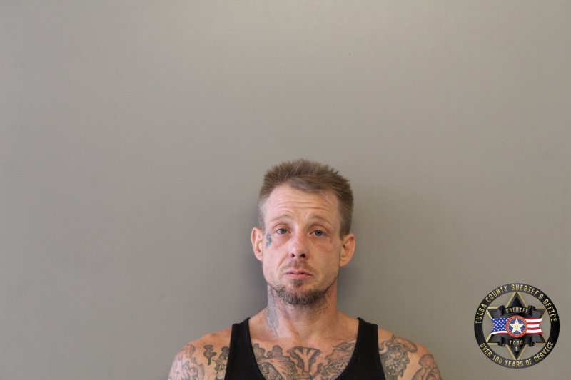 Booking photo of Christopher Mcdonald
