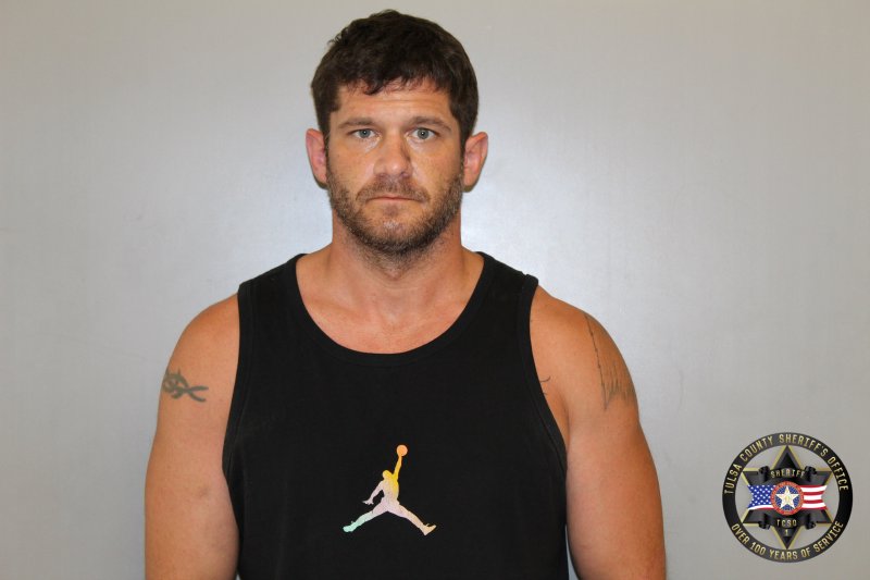 Booking photo of Christopher Greene