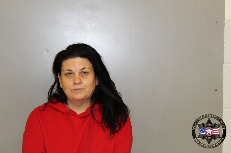 Booking photo of Jamie Woolman