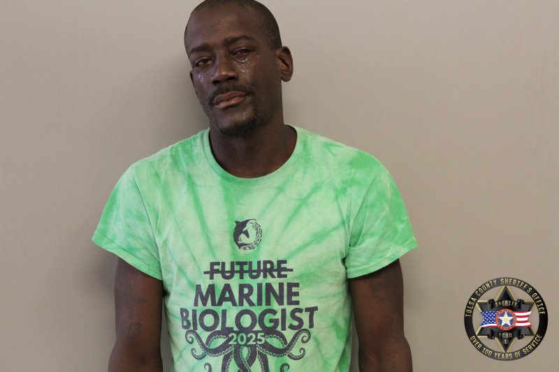 Booking photo of Cedric Robinson