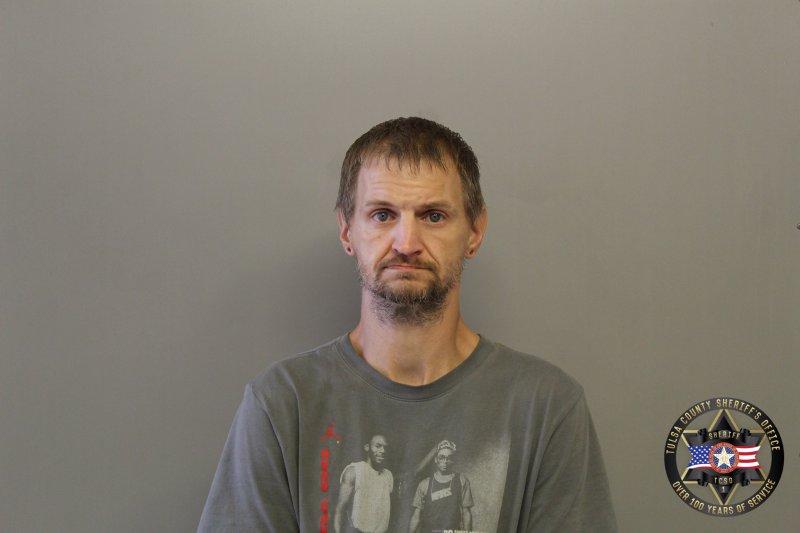 Booking photo of Aaron Stauffer